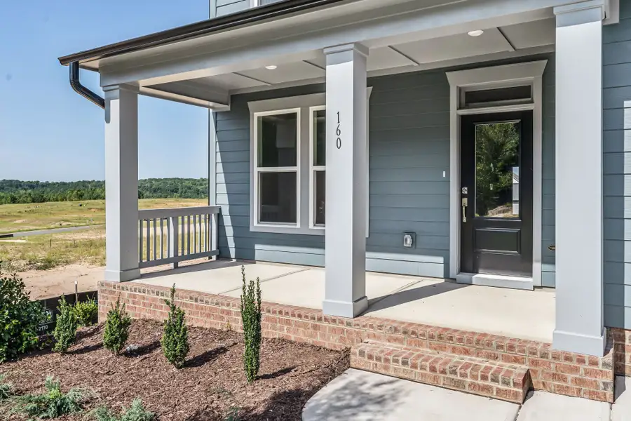 Exterior details and patio area of a home in Serenity - The Village Collection, Fuquay Varina (Image 4).