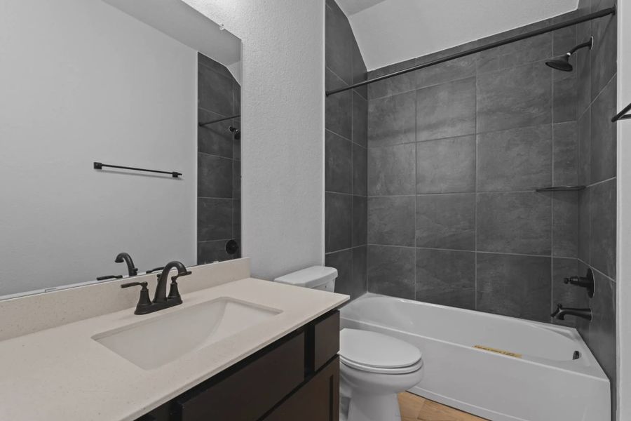 Representative furnished interior of a home built from the San Francisco by Chesmar Homes in The Woodlands Hills, Willis (Image 11). Representative furnished interior of a home built from the San Francisco by Chesmar Homes in The Woodlands Hills, Willis (Image 11).