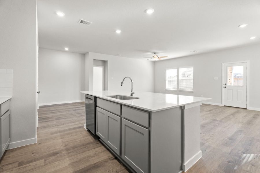 Furnished interior view inside a new home in Sunterra, Katy (Image 4).