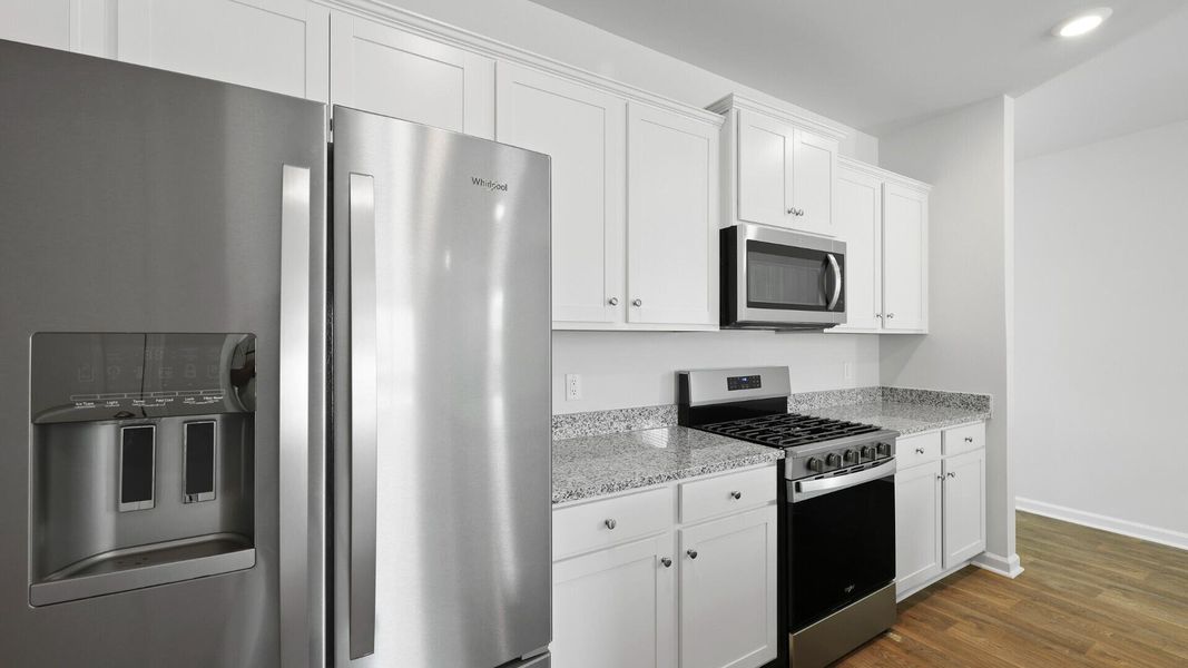 Furnished interior view inside a new home in Pine Hills at Cane Bay, Summerville (Image 7).