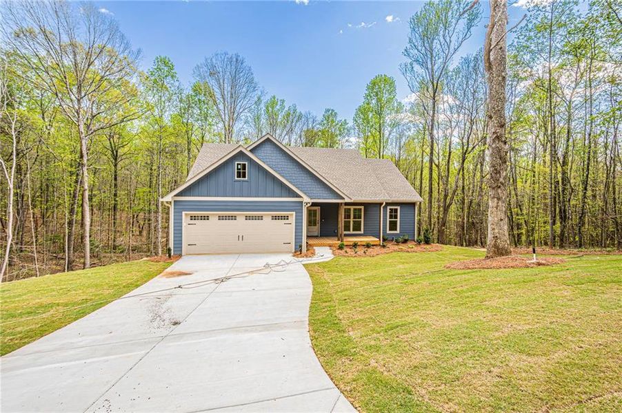 Front exterior of a new home in , Murrayville, GA, highlighting curb appeal (Image 30).