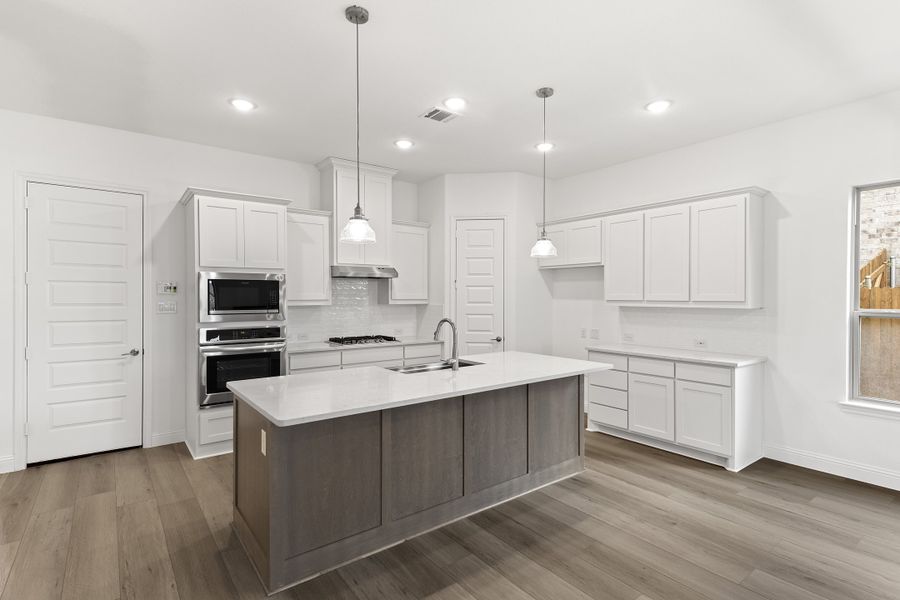 Representative furnished interior of a home built from the Brookstone I by Sandlin Homes in Timberbrook, Justin (Image 8).