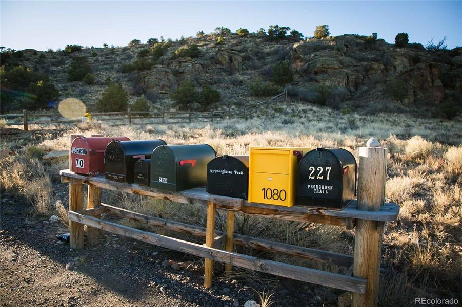Mailboxes outside private gate