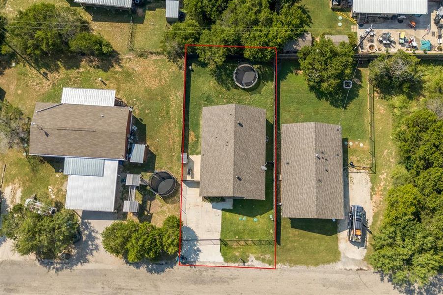 Front exterior of a new home in , Granbury, TX, highlighting curb appeal (Image 24). Front exterior of a new home in , Granbury, TX, highlighting curb appeal (Image 24).