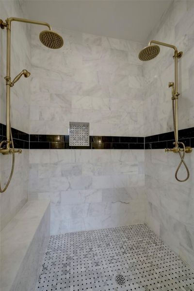 Walk-in shower with double showerheads*photos are of a previously constructed home by the builder. 1527 Hewitt may have different selections at builders sole discretion. These photos are not meant to be an exact representation of 1527 Hewitt.