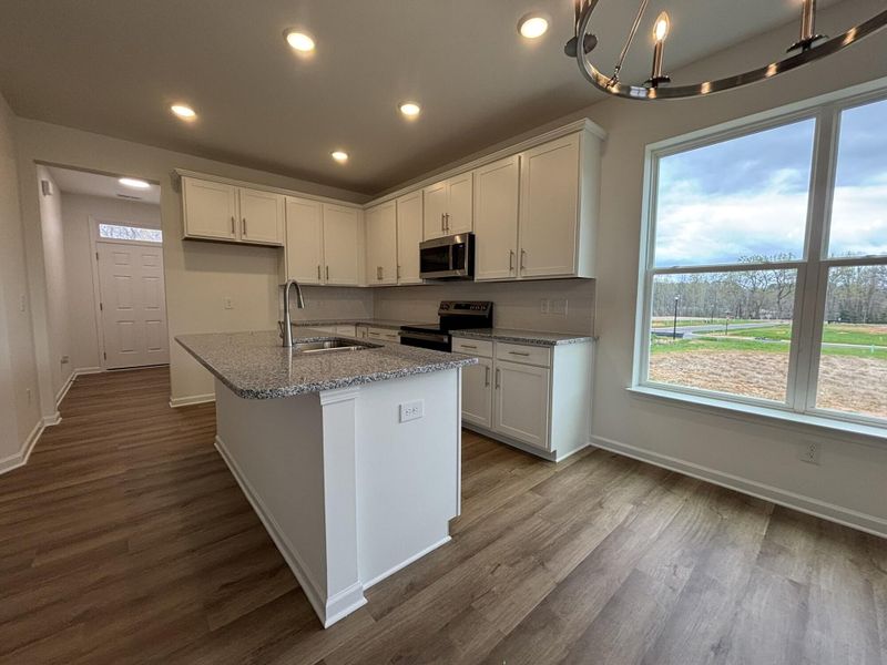 Furnished interior view inside a new home in CraigStone, Woodruff (Image 4).