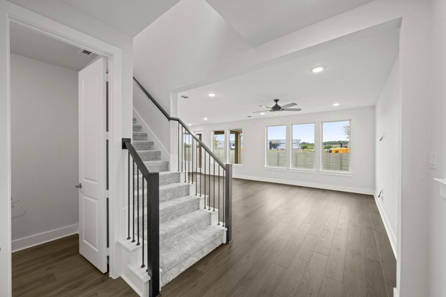Spacious, unfurnished interior of a new home in Cottage Collection at Harvest, Argyle (Image 13).