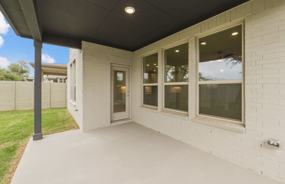 Exterior details and patio area of a home in Wolf Ranch, Georgetown (Image 28). Exterior details and patio area of a home in Wolf Ranch, Georgetown (Image 28).