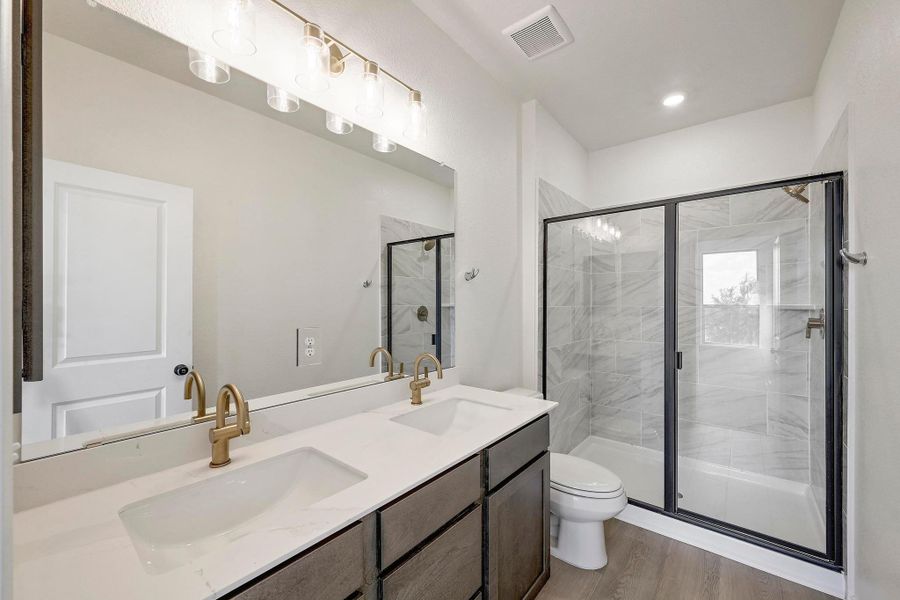 Furnished interior view inside a new home in Creekside at Estancia, Austin (Image 10).