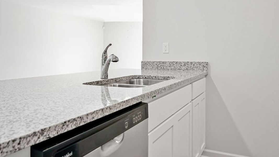 Representative furnished interior of a home built from the BAYSHORE by D.R. Horton in Indigo Preserve Townhomes, Leland (Image 9).