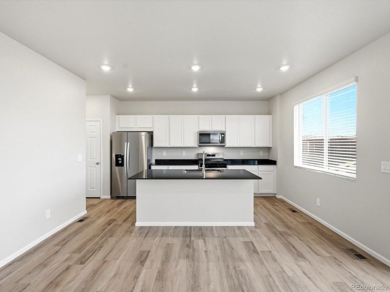 Furnished interior view inside a new home in , Commerce City (Image 11).