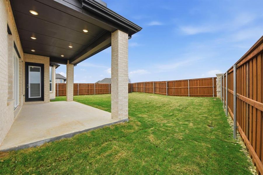 Exterior details and patio area of a home in Wildflower Ranch: 50ft. lots, Dish (Image 19).
