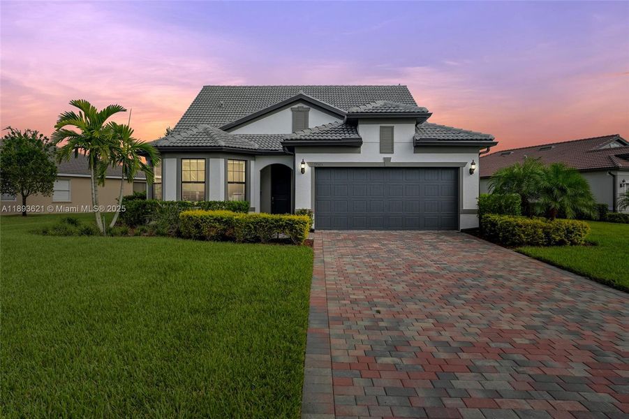Front exterior of a new home in , Alva, FL, highlighting curb appeal (Image 1). Front exterior of a new home in , Alva, FL, highlighting curb appeal (Image 1).