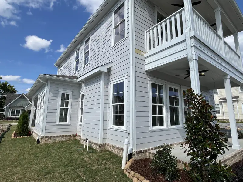 Exterior details and patio area of a home in Heritage Walk, Chattanooga (Image 3).