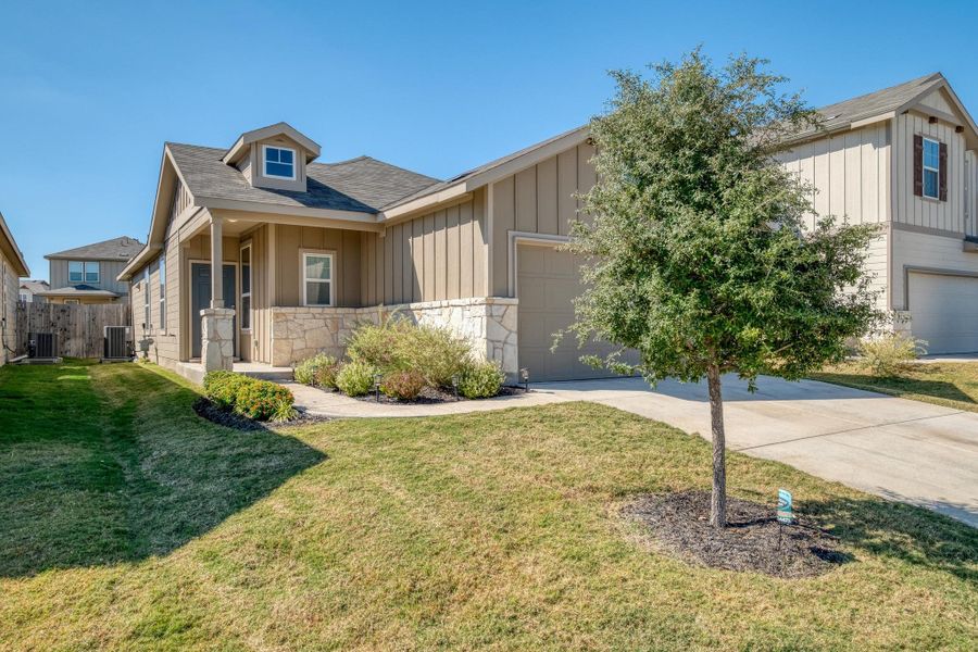 Front exterior of a new home in , Buda, TX, highlighting curb appeal (Image 2). Front exterior of a new home in , Buda, TX, highlighting curb appeal (Image 2).