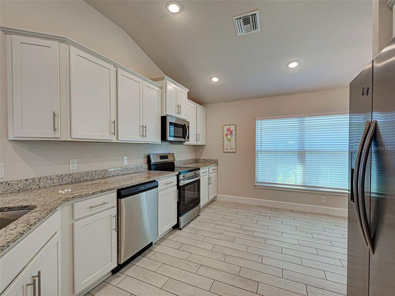 Furnished interior view inside a new home in Watercress Cove, North Port (Image 14).