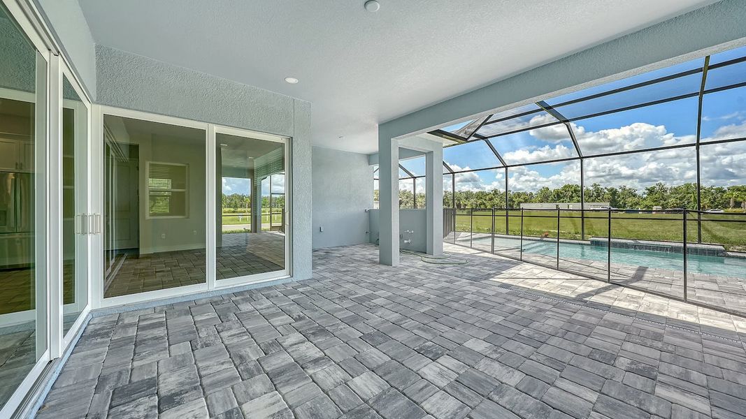 Exterior details and patio area of a home in Canoe Creek Real Estate and Homes for Sale in Parrish, FL - Neal Communities, Parrish (Image 28).