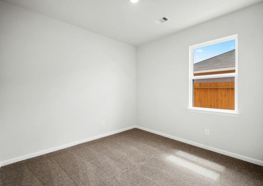 The secondary bedroom has carpet.