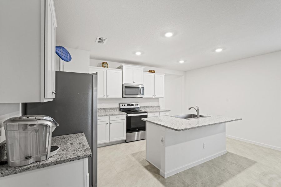 Furnished interior view inside a new home in , Port St. Lucie (Image 32).