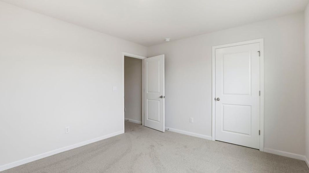 Spacious, unfurnished interior of a new home in Waverly Station, Greenwood (Image 35).