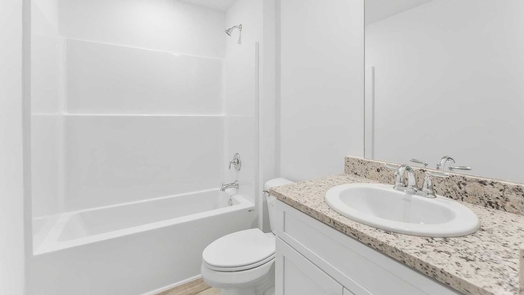 Furnished interior view inside a new home in Sunny Hills, Chipley (Image 12).