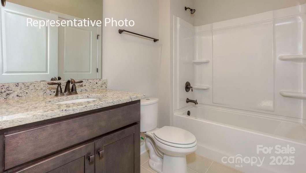 Furnished interior view inside a new home in Sanctuary at Southgate, Indian Trail (Image 15).