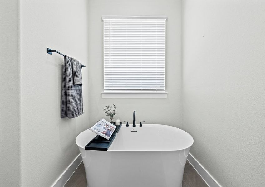The master bathroom has a garden tub.