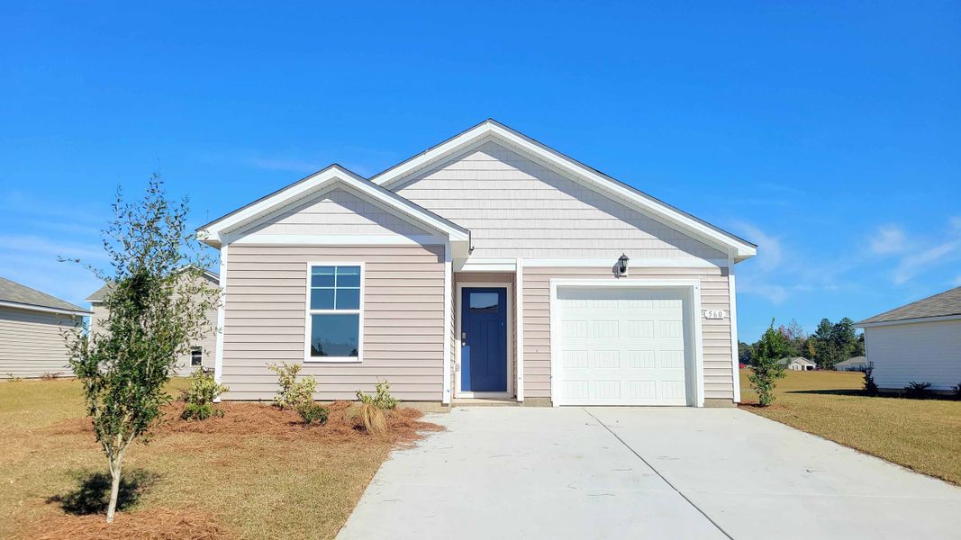Front exterior of a new home in Jordanville Farms, Galivants Ferry, SC, highlighting curb appeal (Image 1).