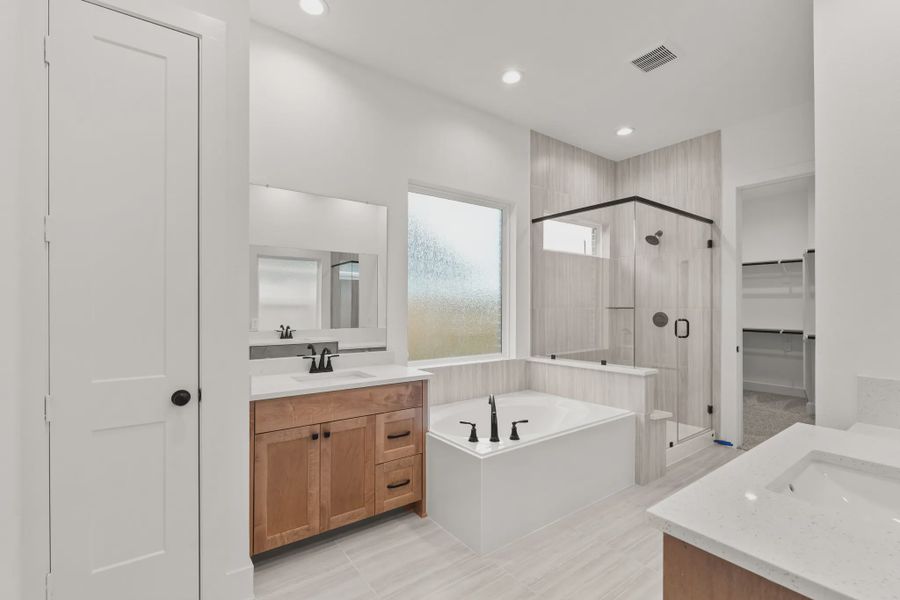 Representative furnished interior of a home built from the Sorenstam by Chesmar Homes in Riceland Alley Loads, Mont Belvieu (Image 50).