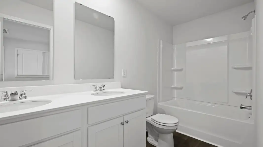 Furnished interior view inside a new home in Pine Hills Townhomes at Cane Bay, Summerville (Image 9). Furnished interior view inside a new home in Pine Hills Townhomes at Cane Bay, Summerville (Image 9).