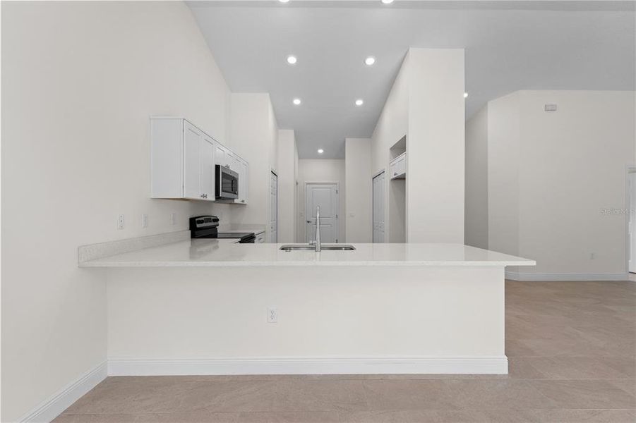 Furnished interior view inside a new home in , Yeehaw Junction (Image 11).