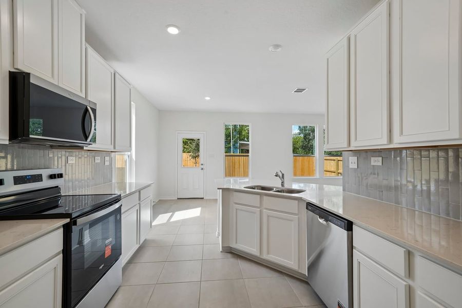 Furnished interior view inside a new home in Nagel Crossing, San Antonio (Image 5).