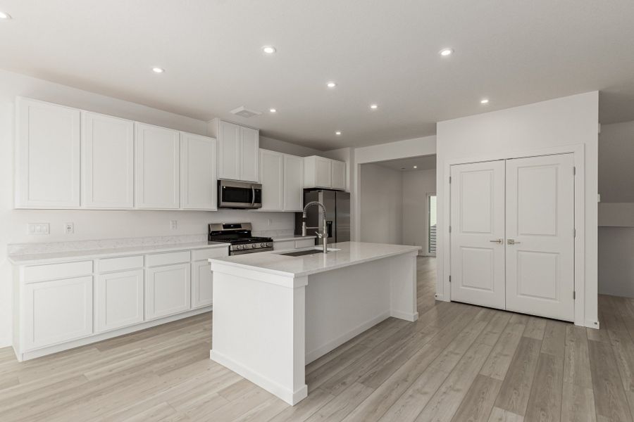 Furnished interior view inside a new home in Parkside at Victory Ridge, Colorado Springs (Image 5).