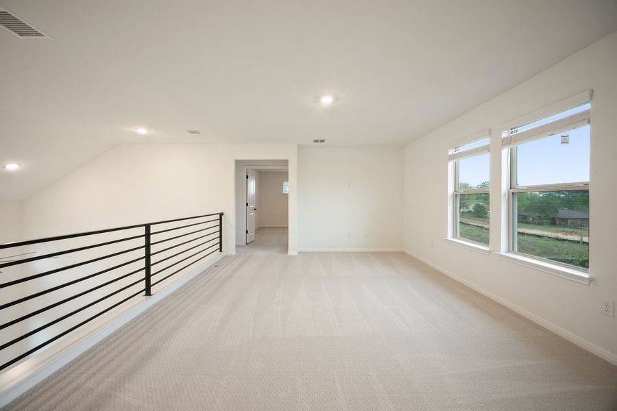Spacious, unfurnished interior of a new home in The Hills of Bear Creek, Manchaca (Image 16).