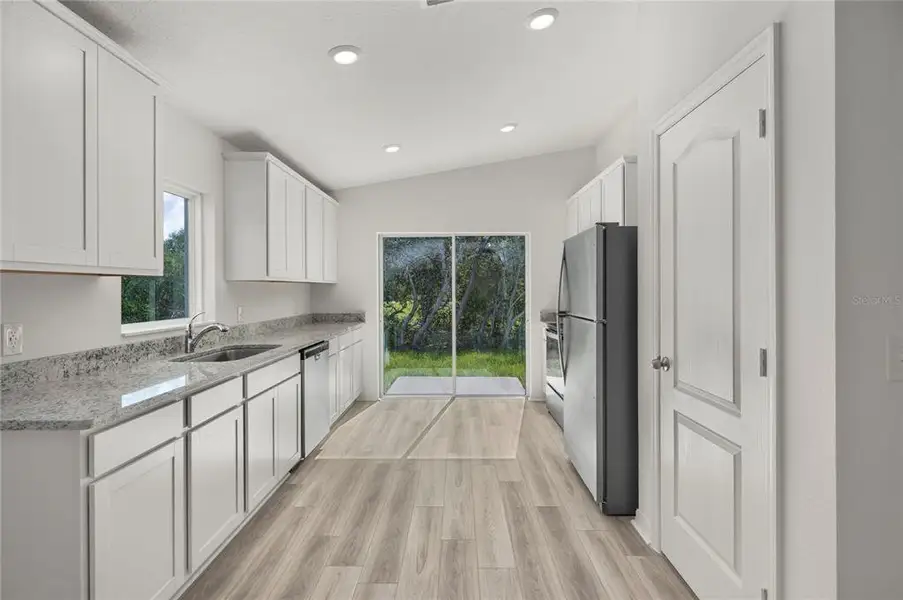 Furnished interior in a model home at Poinciana in Poinciana (Image 5).