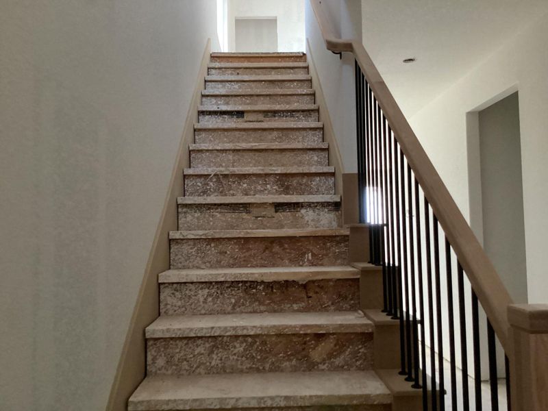 In-progress construction of a new home in The Homestead at Lariat, Liberty Hill, TX (Image 25).