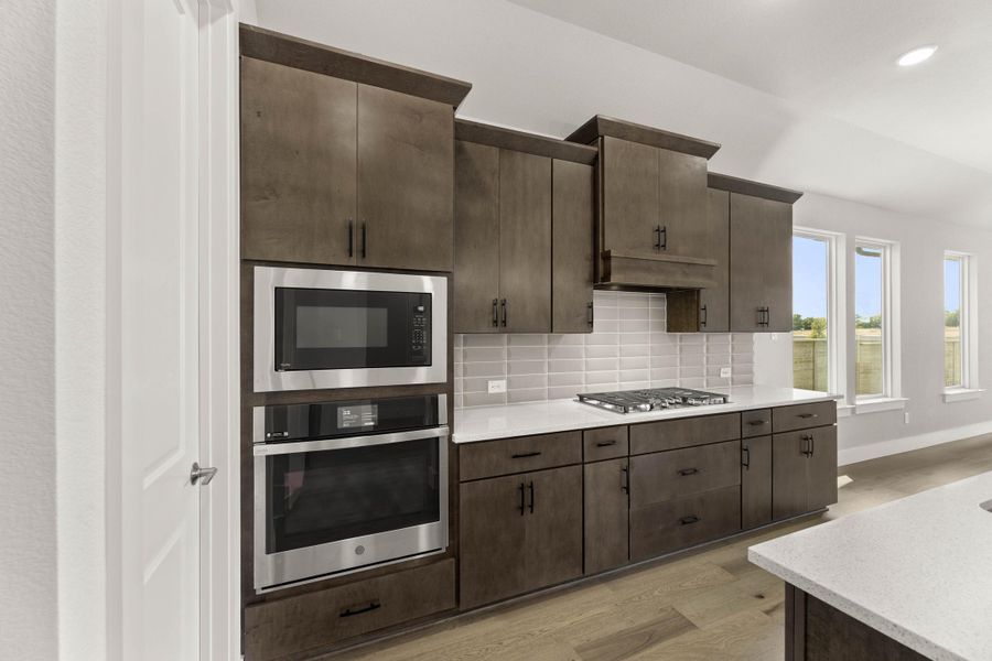 Representative furnished interior of a home built from the Aspen by Tri Pointe Homes in Treeline, Justin (Image 7).