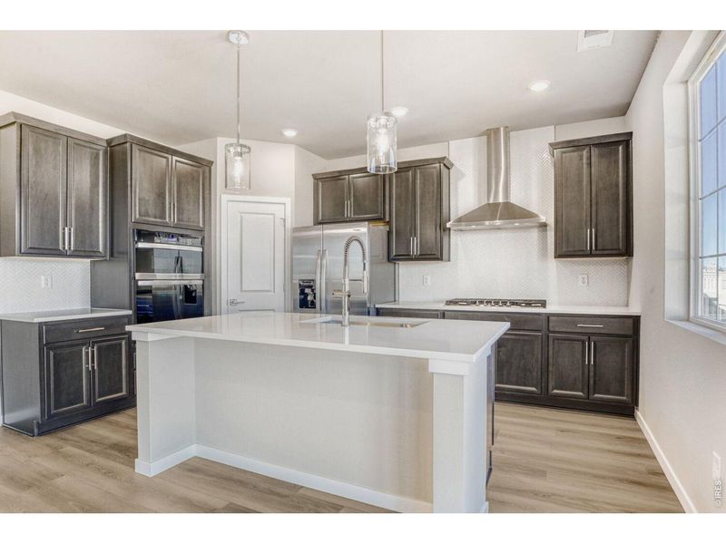 Furnished interior view inside a new home in Farmstead, Berthoud (Image 5).