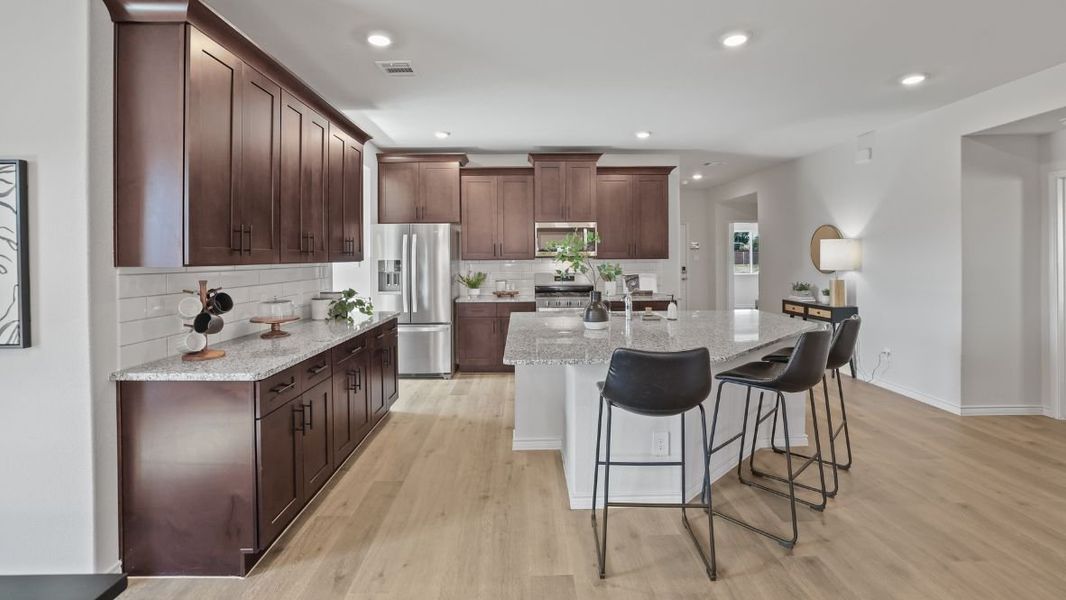 Furnished interior view inside a new home in Prairie Oaks, Oak Point (Image 7).