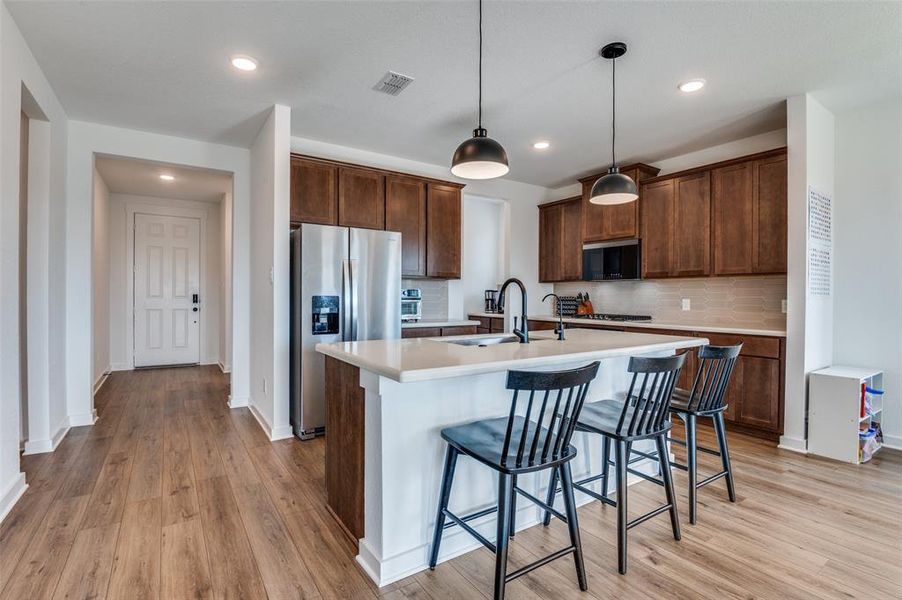 Furnished interior view inside a new home in Prairie Ridge at Goodland, Venus (Image 11).