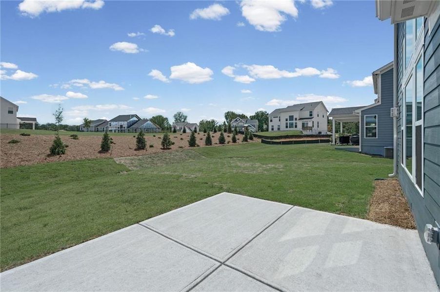Exterior details and patio area of a home in Twin Lakes, Hoschton (Image 4).