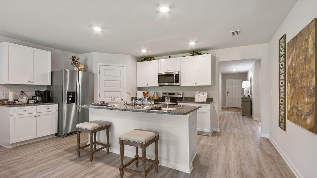 Representative furnished interior of a home built from the Cali by D.R. Horton in Ashton Park Phase III, Freeport (Image 11).