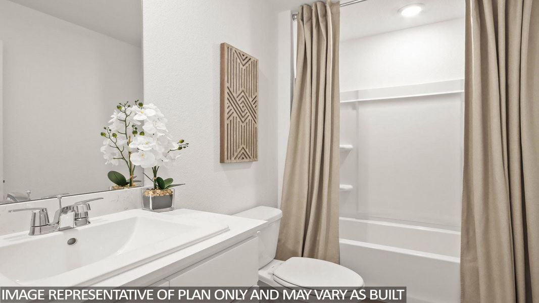 Full bath featuring vanity and shower / bath combo