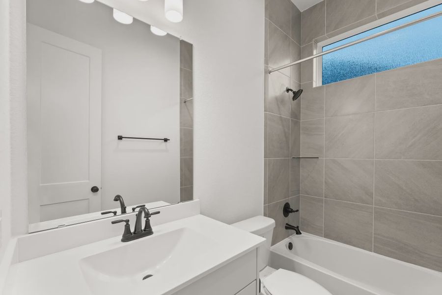 Representative furnished interior of a home built from the Palmer by Chesmar Homes in Riceland Alley Loads, Mont Belvieu (Image 12).