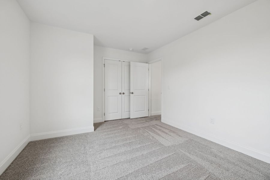 Representative unfurnished interior of a home built from the Montgomery by Ashton Woods in Cades Bluff, Lebanon (Image 22).