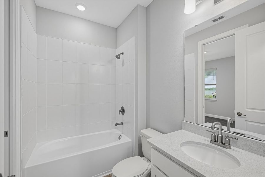 Furnished interior view inside a new home in Coasterra Community Group Page, Palmetto (Image 5).