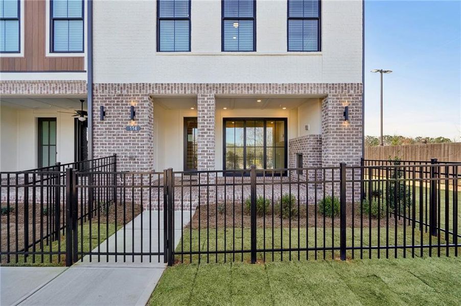 Exterior details and patio area of a home in IveyBrooke, Alpharetta (Image 3).