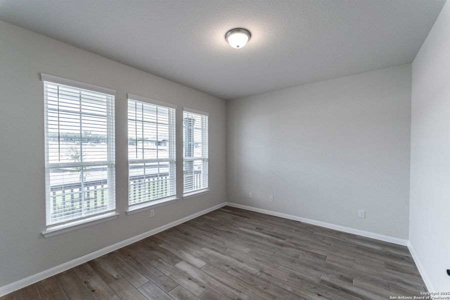 Spacious, unfurnished interior of a new home in The Woodlands at Medina Hills, Mico (Image 17).