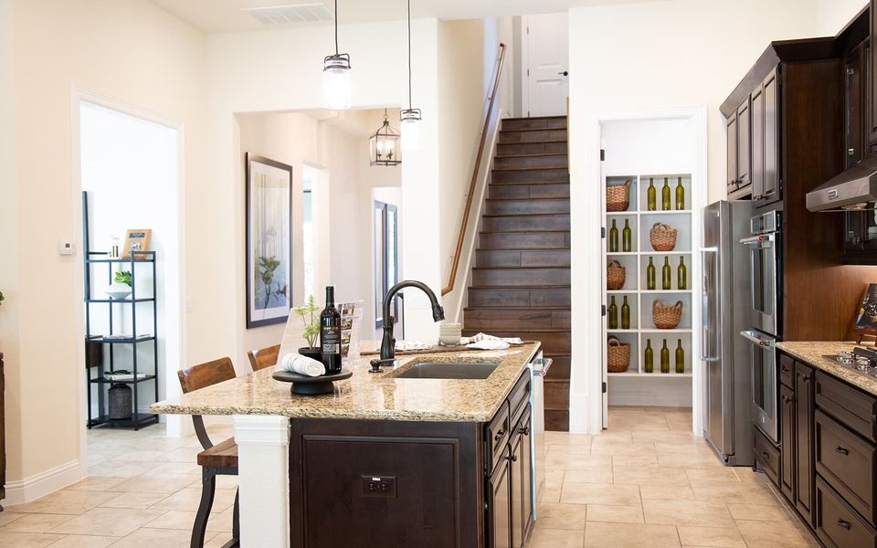 Furnished interior view inside a new home in Kissing Tree, San Marcos (Image 3).