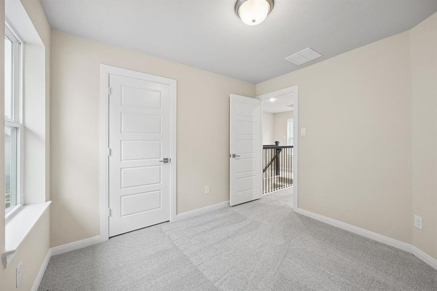 Spacious, unfurnished interior of a new home in Painted Tree Woodland West – Cottages, McKinney (Image 26).
